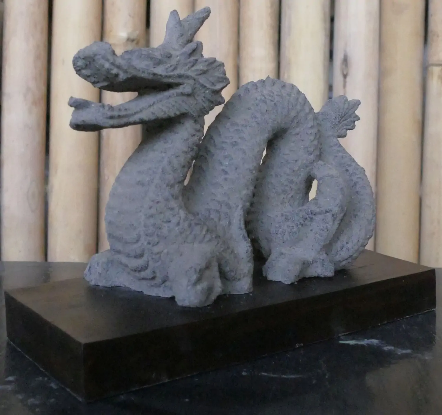 Product image 2 of the product “Reclining dragon, on a wooden base, approx. 16 cm. antique finish, cast lava stone ”